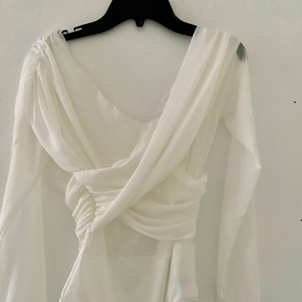 Very flattering body suit worn on or off shoulders